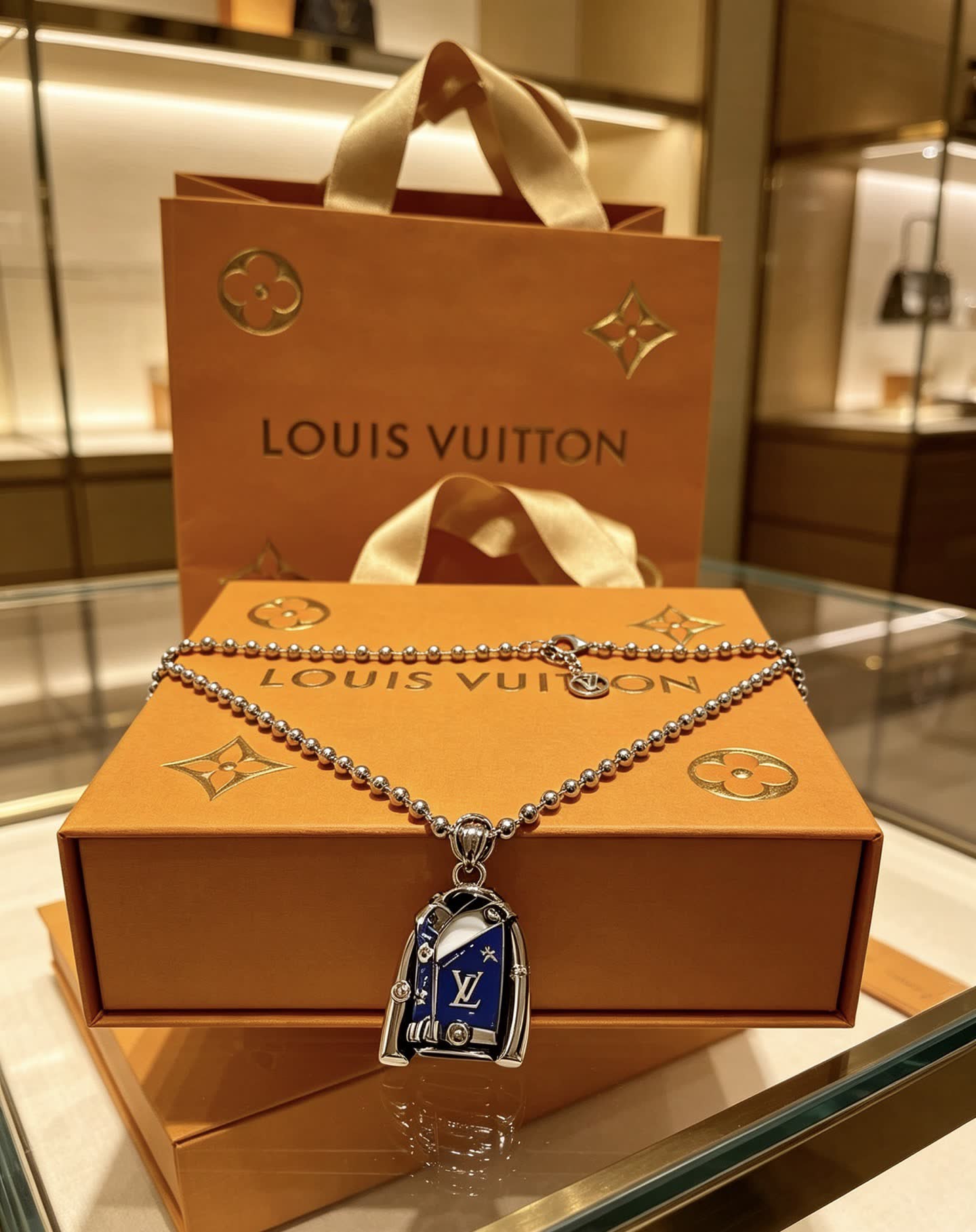 Louis Vuitton Silver Beaded Necklace with Blue Enamel Charm